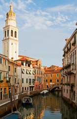 Canal in Venice in afternoon light.