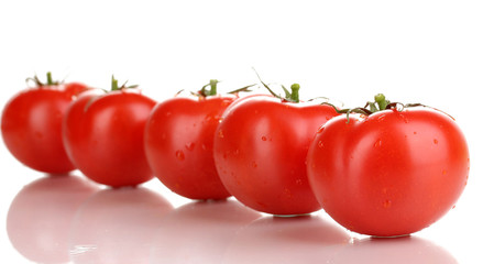 Fresh tomatoes isolated on white