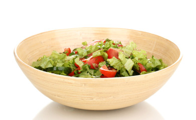 Fresh salad with tomatoes and cucumbers isolated on white