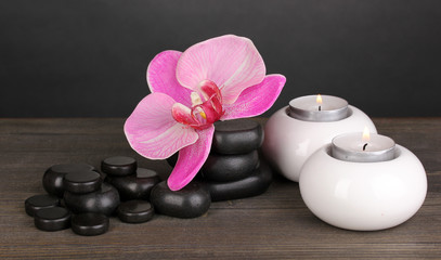 Spa stones with orchid flower and candles