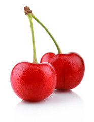 Ripe wet cherry berries isolated on white