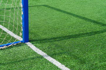 Part football field with goal.