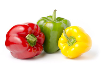 Three sweet peppers red, yellow and green color