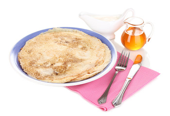 Stack of tasty pancakes isolated on white