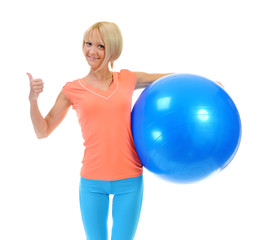 Young woman with blue ball