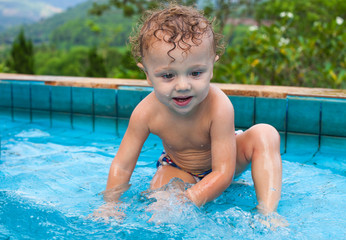 little boy in the pool