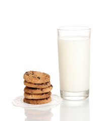 Glass of milk and cookies isolated on white