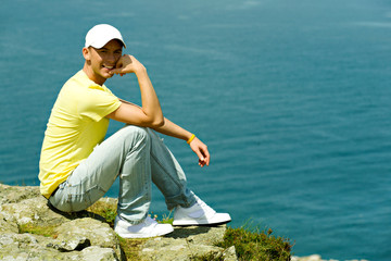 young man with his sunglasses outside