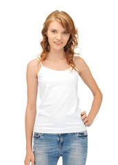 Fototapeta premium smiling teenage girl in blank white t-shirt