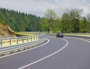 Asphalt twisty mountain road in hills in Slovakia