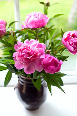 vase with peony flowers