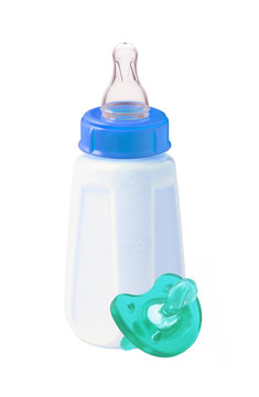 baby milk bottle and dummy isolated on white