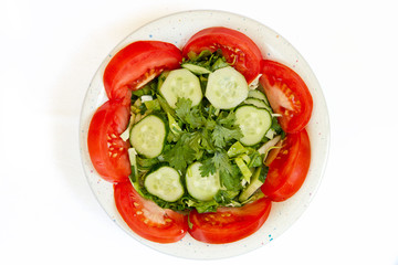 Vegetable salad on white