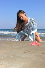 Young woman in the sea