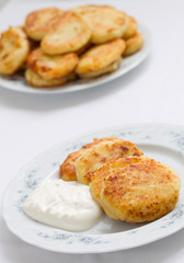 Cottage Cheese Pancakes, Syrniki, tvorozhniki with sour cream