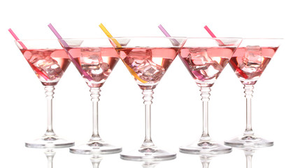 Red cocktail in martini glasses isolated on white