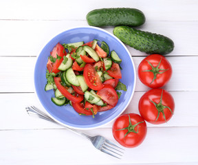 Fresh salad with tomatoes and cucumbers