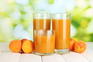 glasses of apricot juice  and fresh apricots