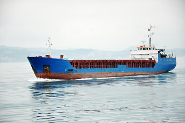 Fototapeta premium The cargo ship on coast Sochi in a fog