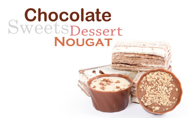 Chocolate and nuts over white