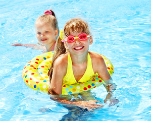 Children  in swimming pool.