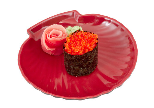Sushi with fying fish caviar isolated over white background