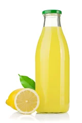 Crédence de cuisine en verre imprimé Jus Bottle of lemon juice and fresh lemons