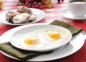 Fried eggs and blueberry bagles