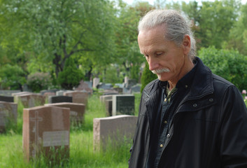 Man in cemetery