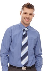 Portrait of confident businessman smiling