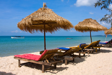 Sun loungers with an umbrella