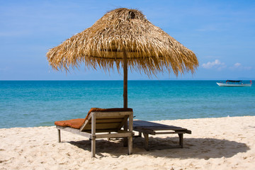 Sun loungers with an umbrella