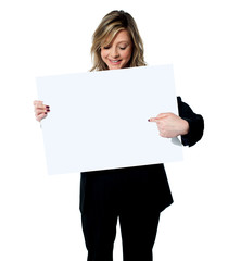 Fototapeta premium Executive pointing at empty banner ad board