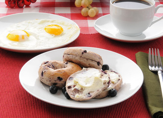 Blueberry Bagles with eggs and coffee