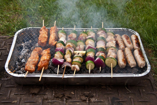 Kebabs and sausages cooking bbq