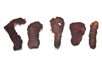 Biltong-(beef jerky) isolated on a white studio background.