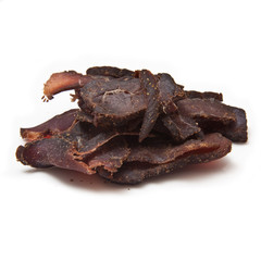 Biltong-(beef jerky) isolated on a white studio background.