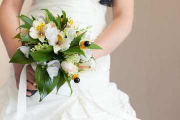 Bridal wedding bouquet of flowers on wedding day