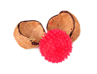 Coconut shells with red ball isolatet on a white backround
