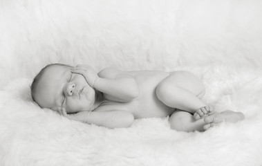 Portrait of sleeping newborn, black and white