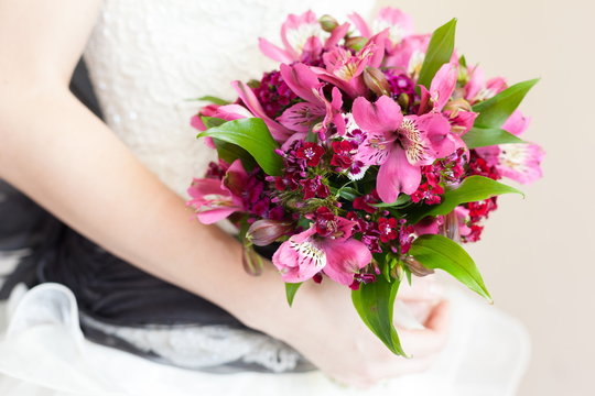 Bridal wedding bouquet of flowers on wedding day