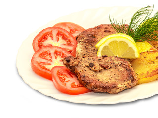 roasted steak meat with vegetables isolated on white background