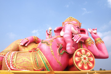 Big pink Ganesha in relaxed pose, From temple in Thailand