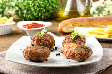 Meatballs with garlic, parsley and onion