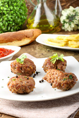 Meatballs with garlic, parsley and onion