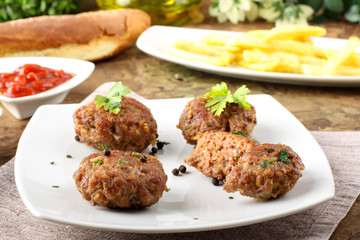Meatballs with garlic, parsley and onion