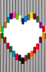 Many different color pencils, heart