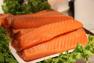 in corner pieces of salmon and tuna fish