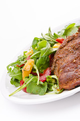 cervical chop with apricot-rocket salad