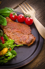 cervical chop with apricot-rocket salad
